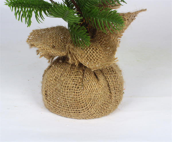 Kleine kerstversieringen in jute basis